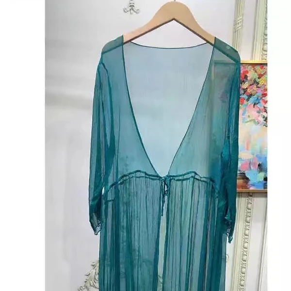 2025年秋季新款纯色桑蚕丝披肩女长袖薄款开衫中长款真丝外披百搭