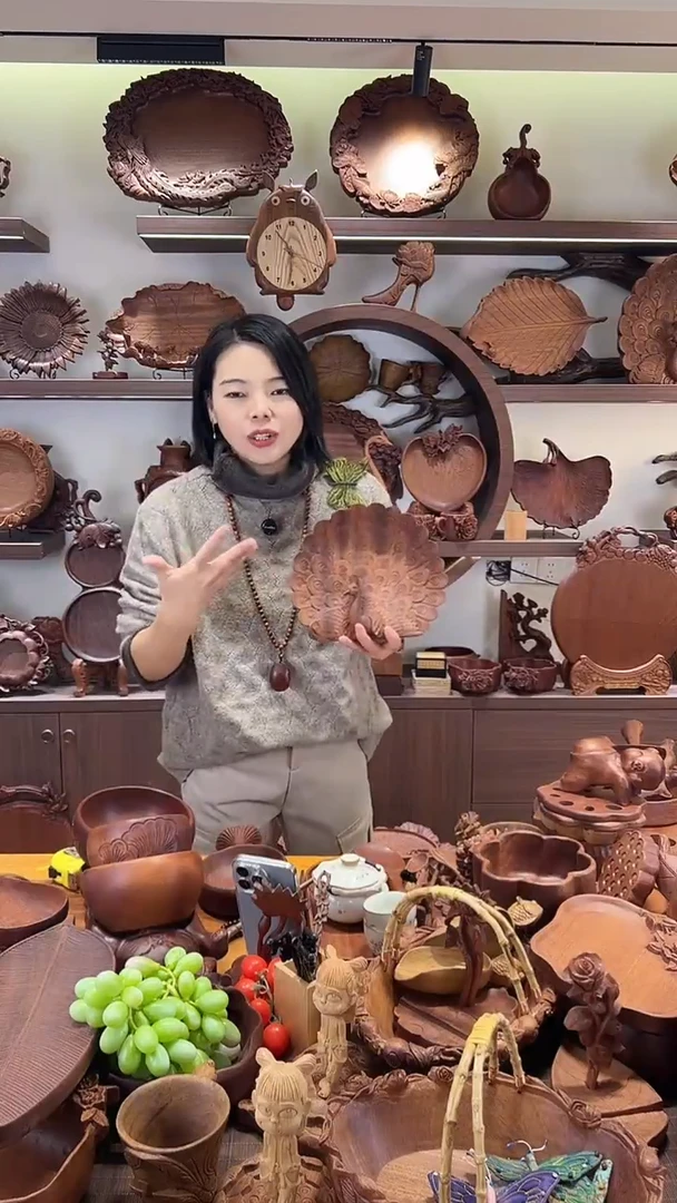 乌木类木雕款孔雀开屏盘