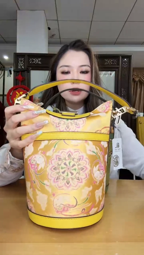 织物u****9黄色桶包