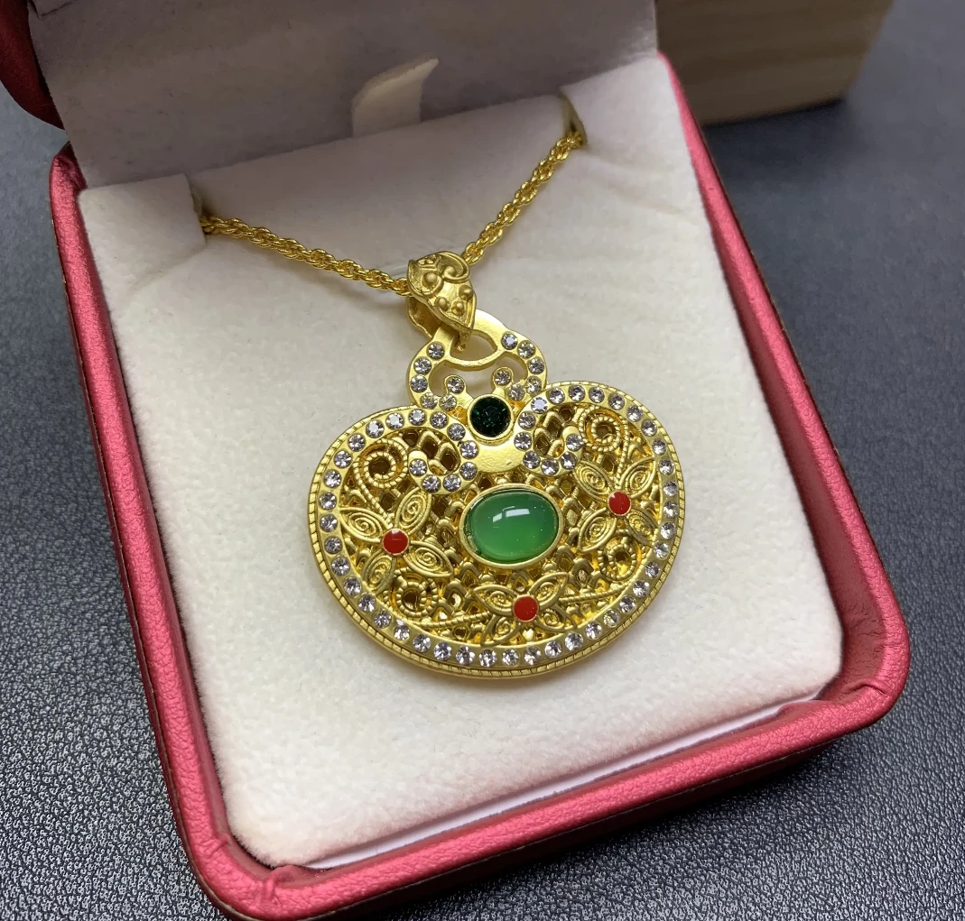 （龙翦晶）馆藏轻奢高端祥云锁吊坠22983