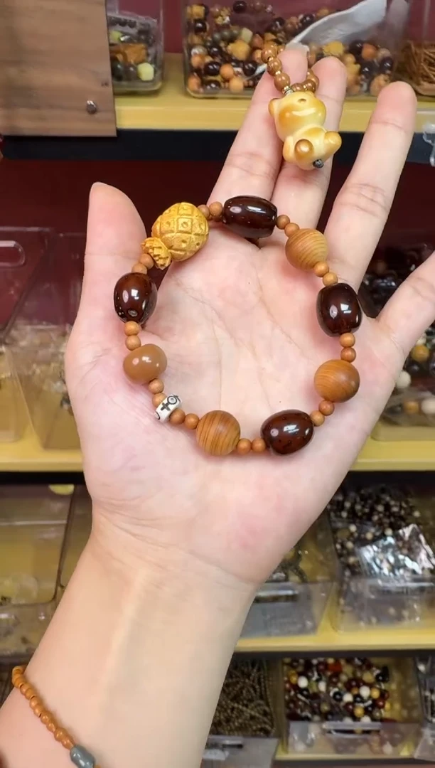 非洲檀香无事牌002紫金菠萝手串