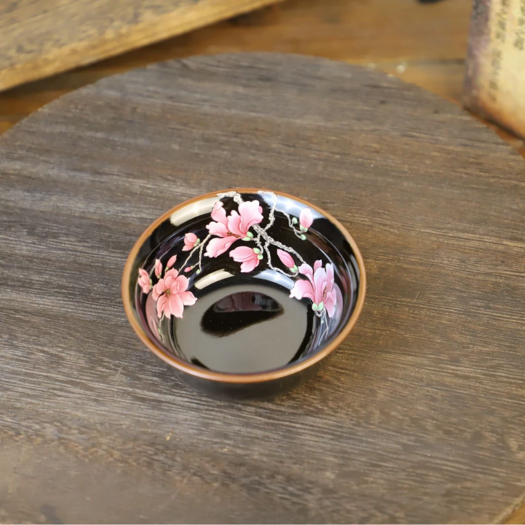 乌金釉粉玉兰普洱杯