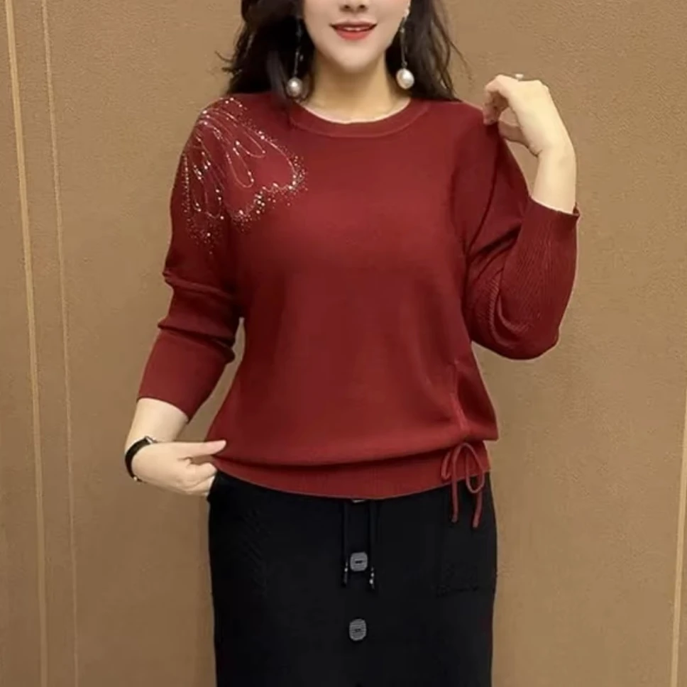 高档重工烫钻蝴蝶妈妈毛衣春季新款时尚洋气宽松遮肉抽绳针织衫女