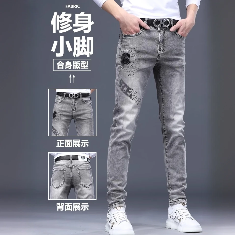 希敦纽勒灰色牛仔裤男春秋款潮欧货烫钻印花弹力修身小脚休闲长裤