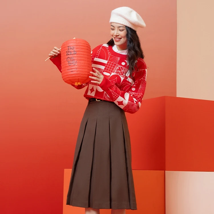 特步运动毛衣女士25春季红色休闲满印针织衫9751285D0557