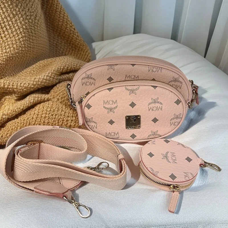 95新 MCM 粉色五合一斜挎包  1191 4558