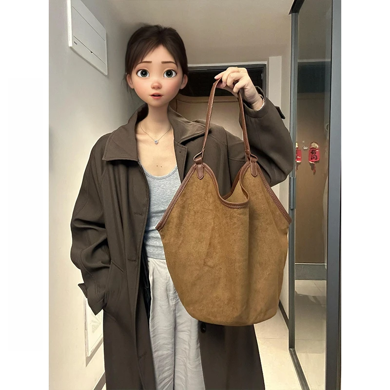 磨砂托特包包女款2025新款松弛感大容量通勤腋下包手提单肩水桶包