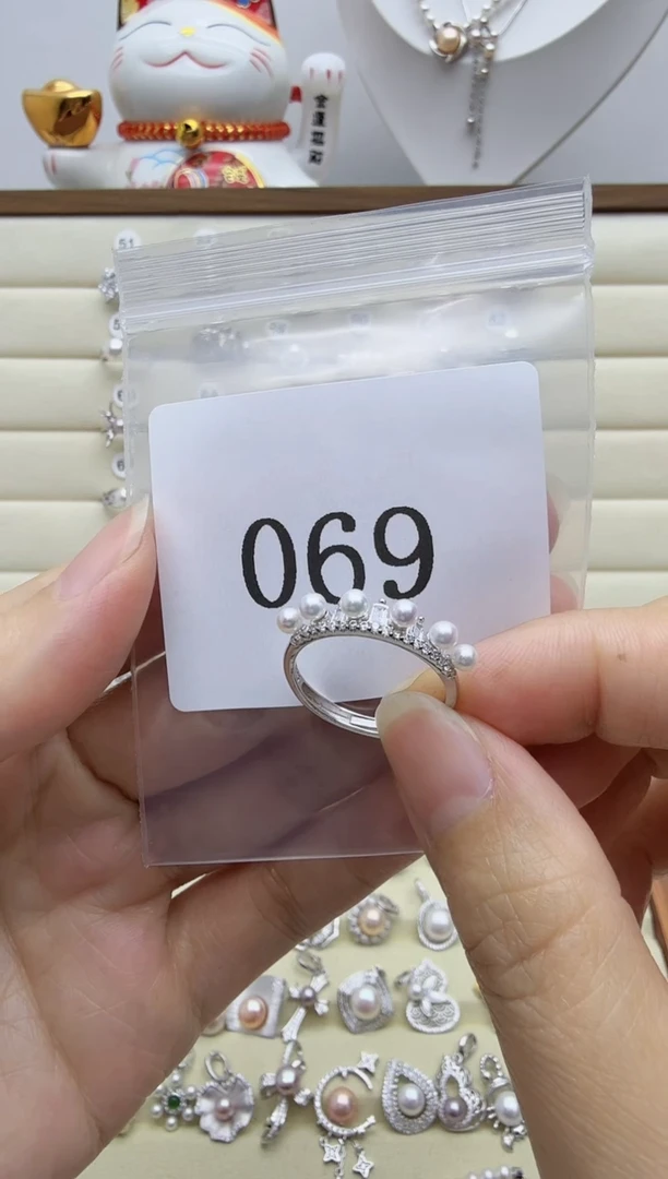 银S925镶嵌戒指淡水珍珠反***猫069