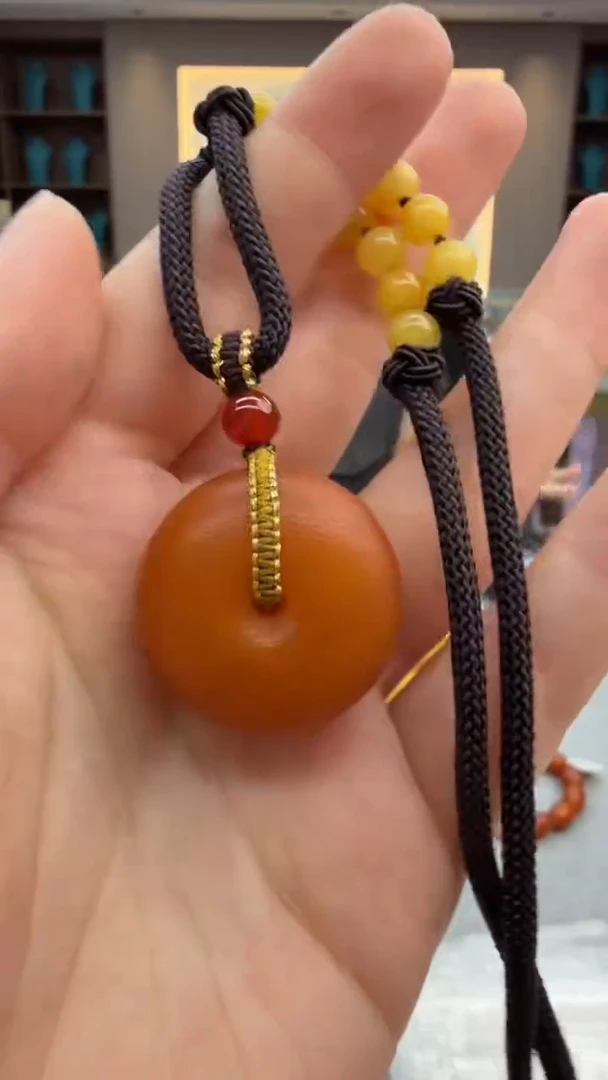 琥珀颈饰未镶嵌49秒拍号 假一罚三