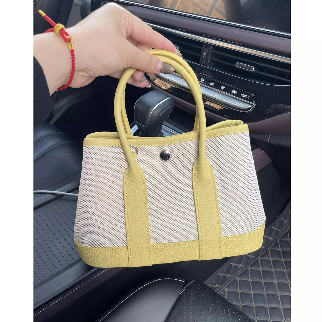 拼接帆布花园手提托特包包女士2025新款高级感小众通勤单肩斜挎包