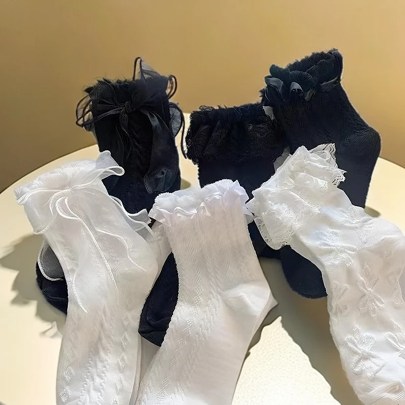 简约白色蝴蝶结花边袜子女中筒袜夏天薄款日系甜美Lolita蕾丝jk袜