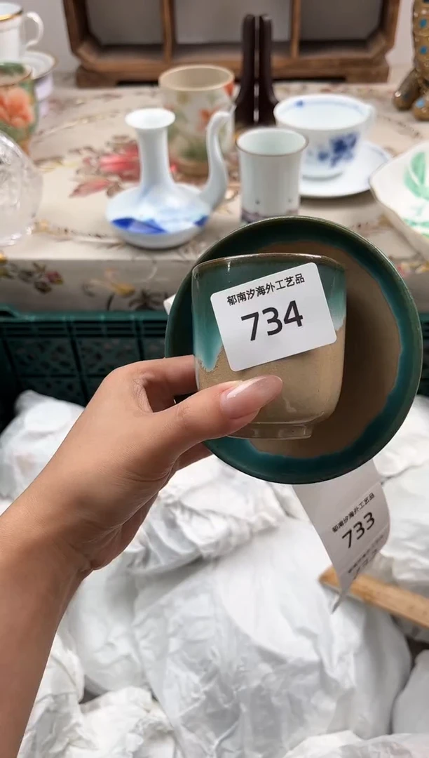 瓷片c****蘭H         734