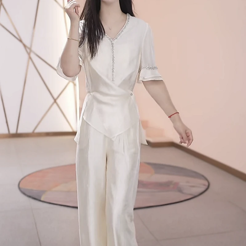 上衣+休闲裤2025夏季新款时尚优雅简约白色修身显瘦收腰洋气套装