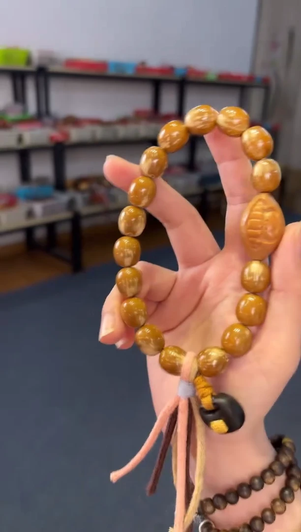 吊坠菩提根/象牙果花皮紫金鼠枣珠手持