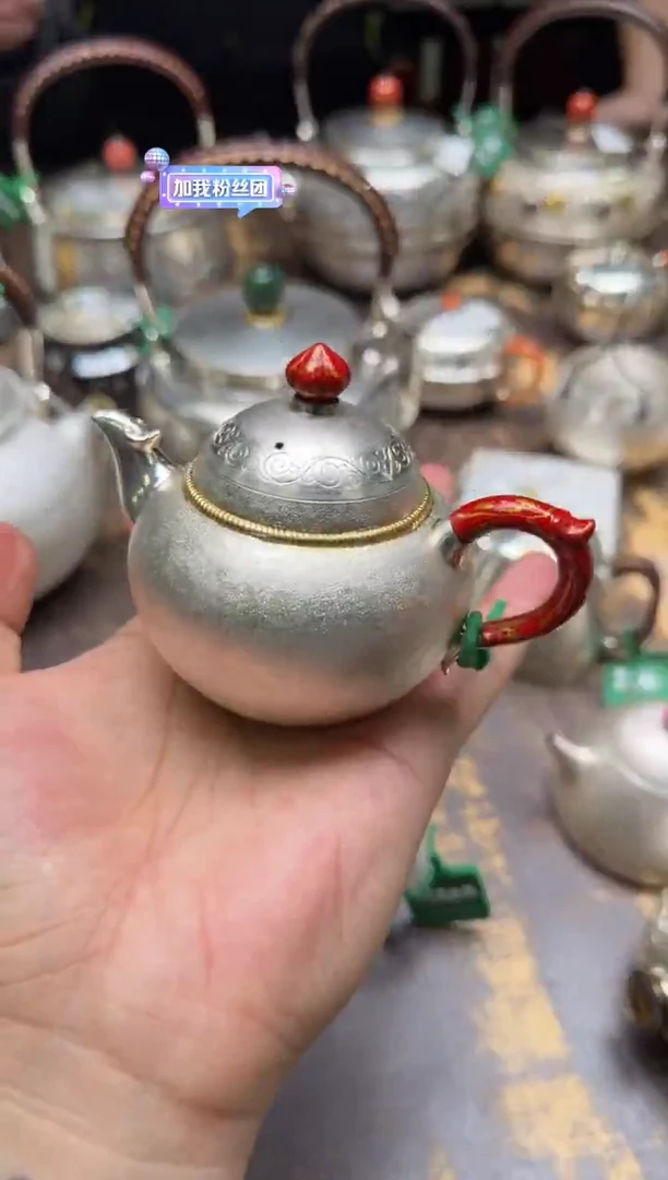 哈*呆坐手敲雪花纹錾刻鎏金有凤来仪如意壶