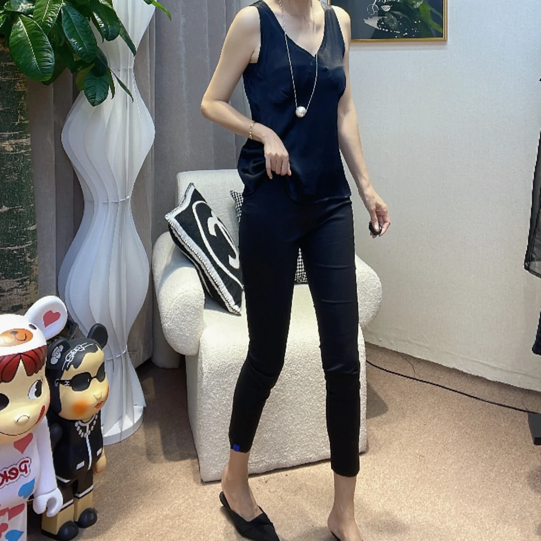 那服饰松紧纸皮裤