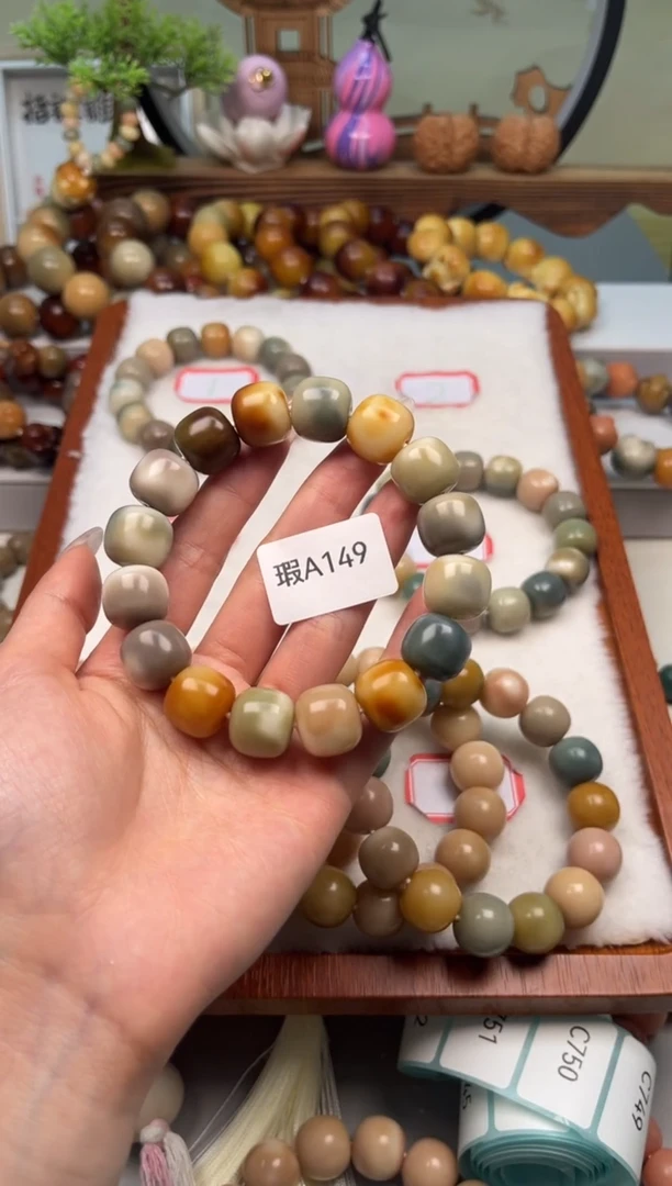 【闪购商品】菩提根/象牙果手串瑕A149桶珠14mm一串