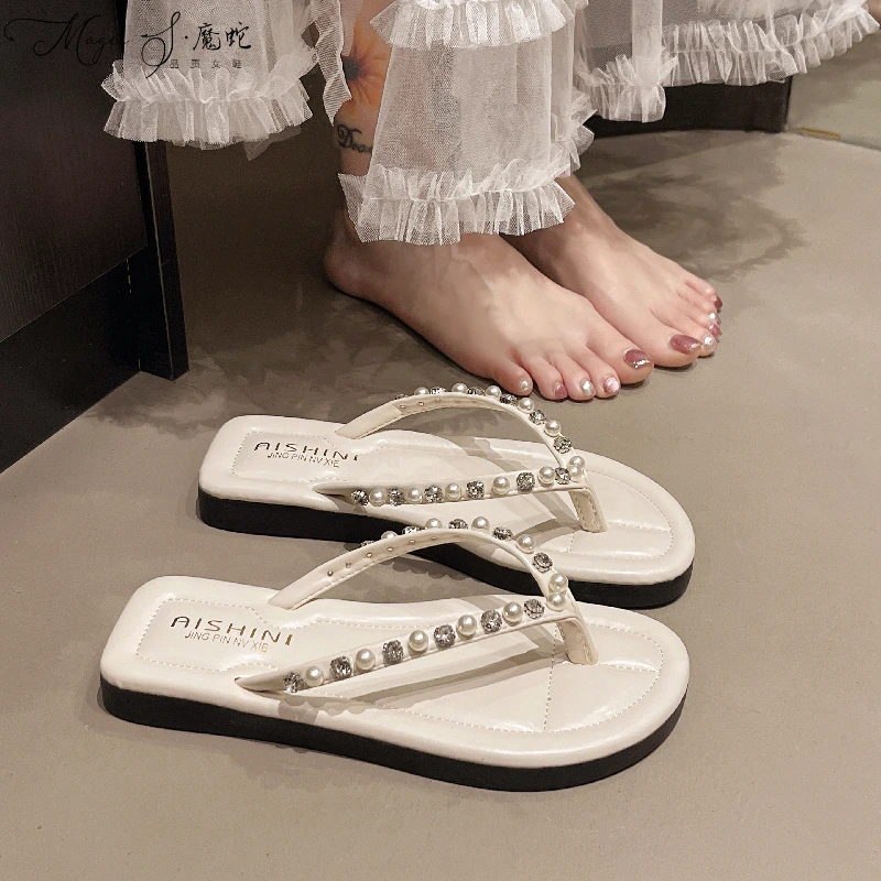 【万达撤柜】夹脚沙滩人字拖鞋女外穿感厚底新款平底防滑外出网夏季