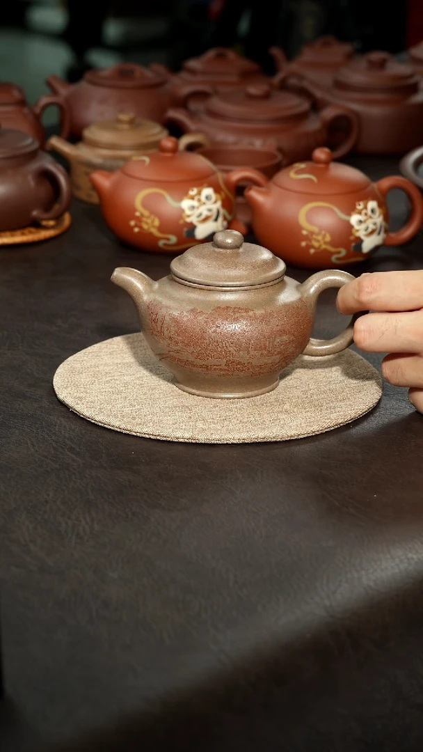 茶壶紫砂?***。07蟹壳青刻绘掇只