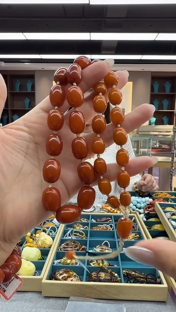 琥珀颈饰未镶嵌165秒拍号 假一罚三