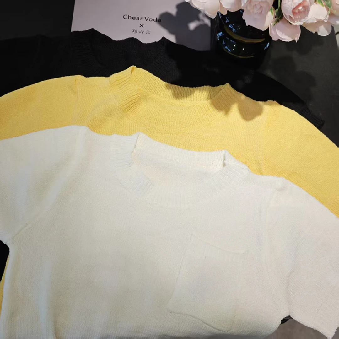 时尚简约圆领镂空针织短袖5235