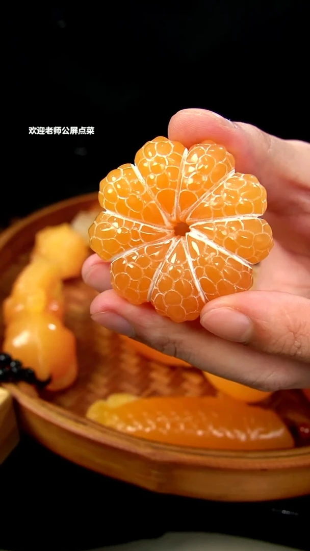 印尼石小桔子手把件