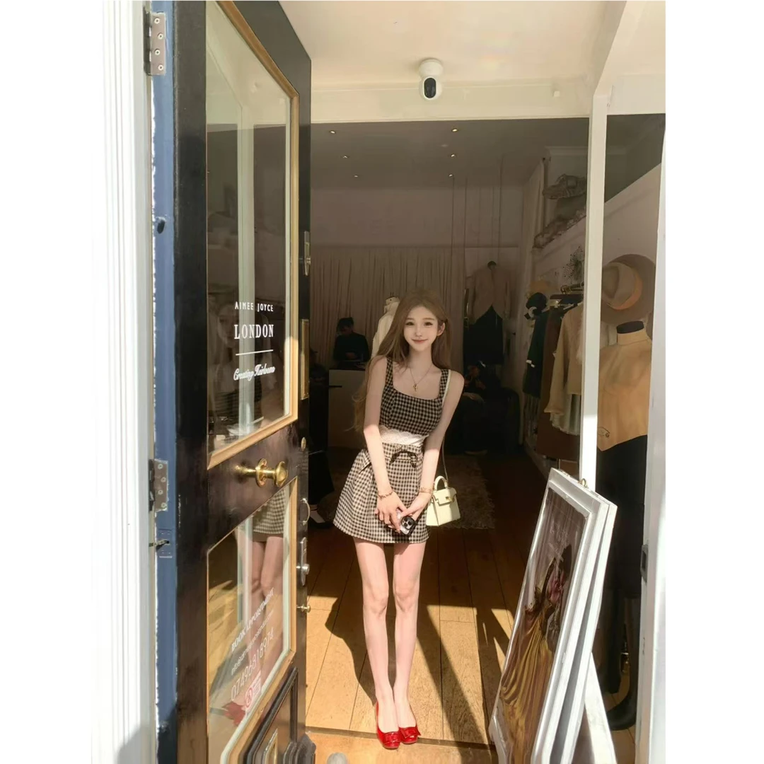 设计感纯欲辣妹气质镂空蕾丝连衣裙女夏季2025新款收腰显瘦短裙子