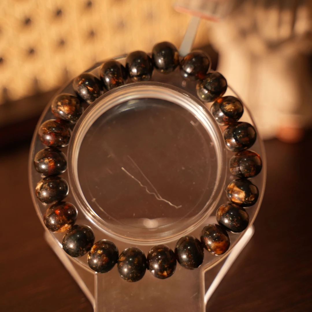 纯天然抚顺琥珀（黑花手串）