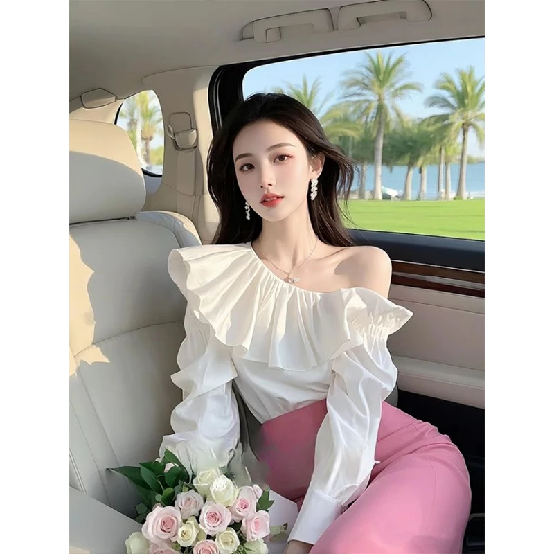 2025年春季法式高级轻奢减龄洋气荷叶边上衣独特漂亮白色斜肩衬衫