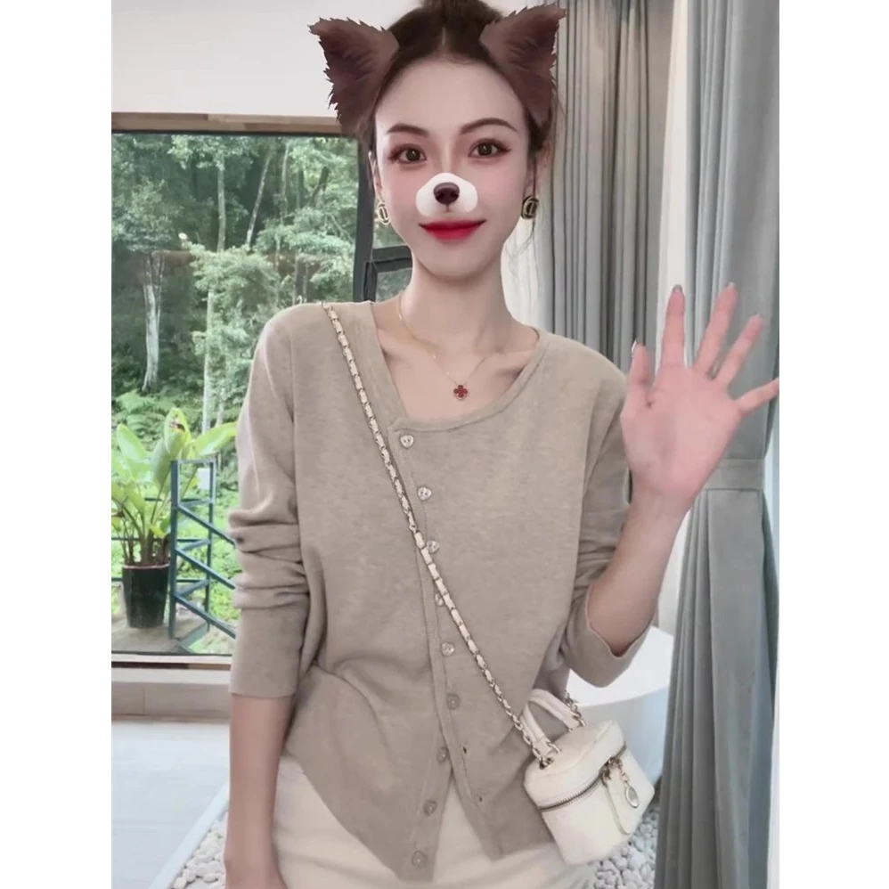 D085-初春设计感斜扣不规则长袖针织衫女春秋新款宽松开衫上衣