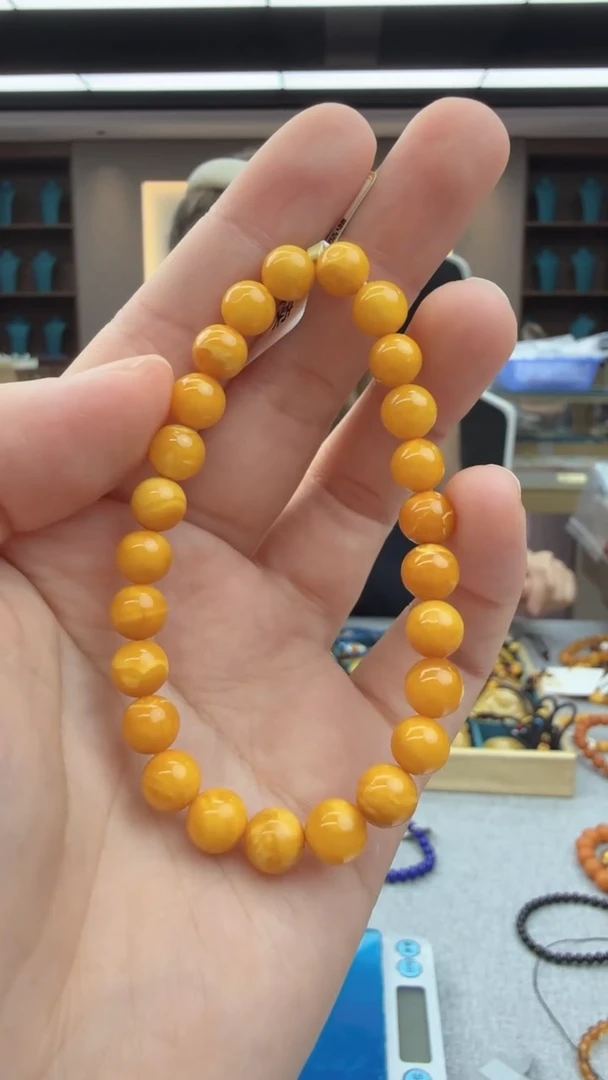 未镶嵌琥珀手链194秒拍号 假一罚三