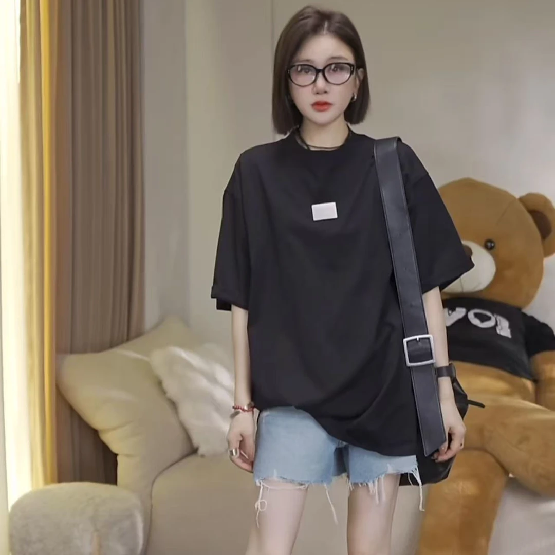 JW/静稳2025夏时尚宽松休闲圆领女款减龄短袖创意图案T恤5551017