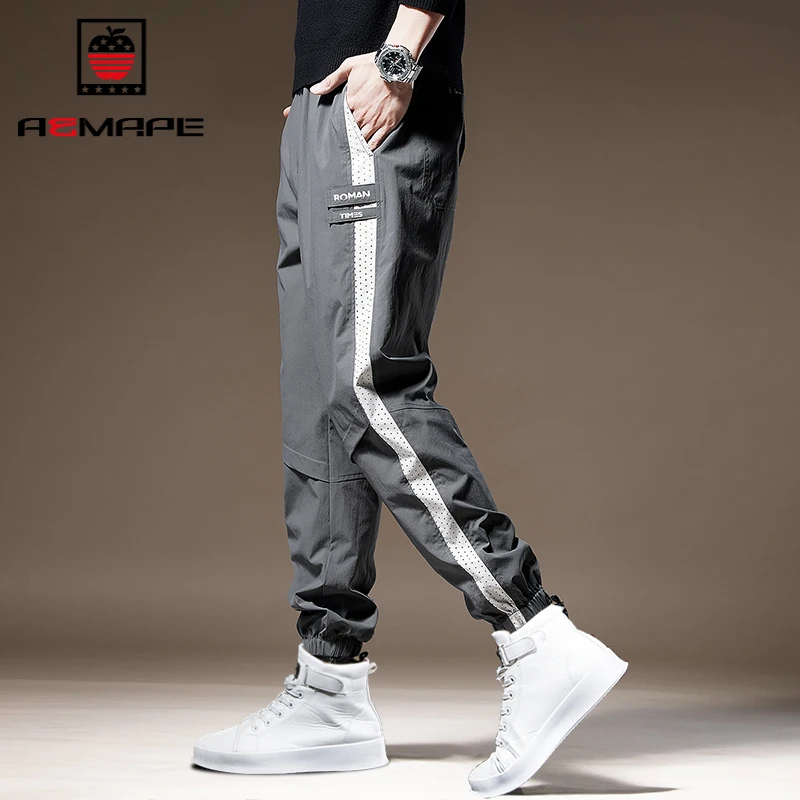 高端户外拼接休闲裤秋季新款百搭宽松工装户外运动束脚裤男款男士