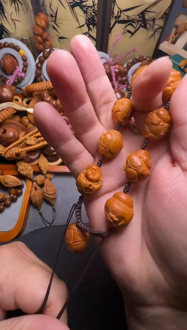 手串橄榄核与**.弥勒一个