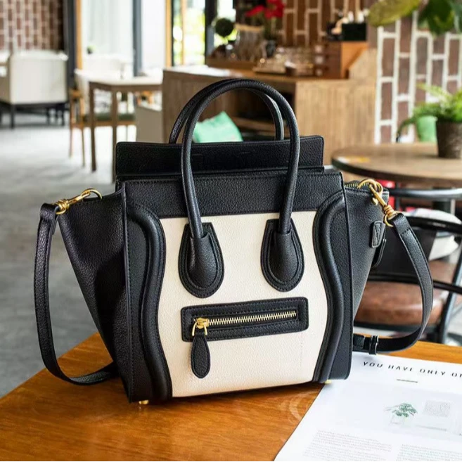 设计感笑脸包单肩斜跨手提包百搭女士包H009