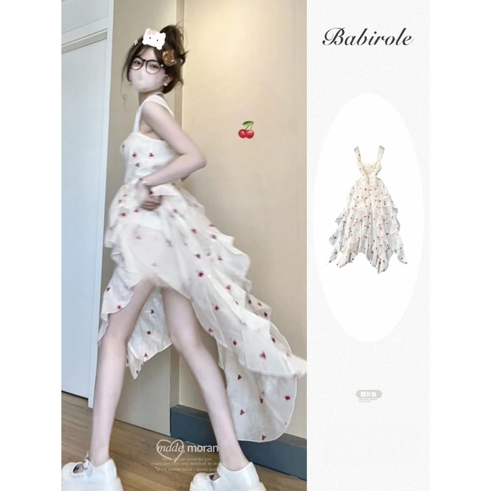 纯欲甜辣风漂亮独特碎花吊带连衣裙女夏季海边度假风不规则沙滩裙