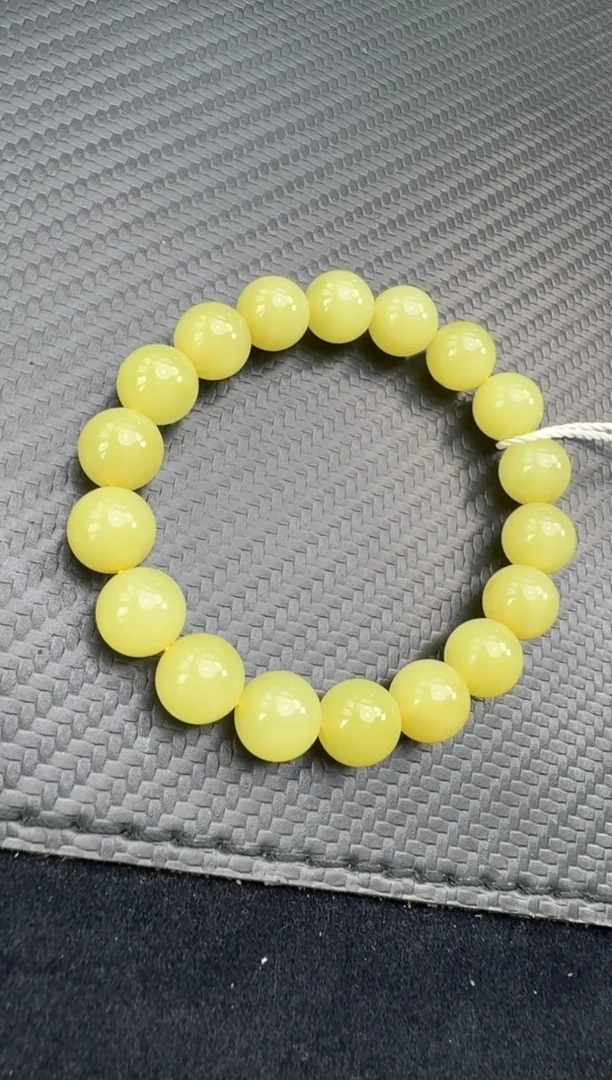 未镶嵌手串和田玉若羌微色差鸡油黄卡11手串