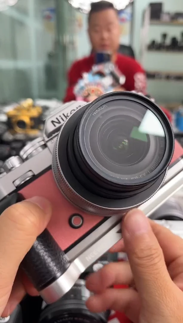 99新粉色zfc+16-50镜头