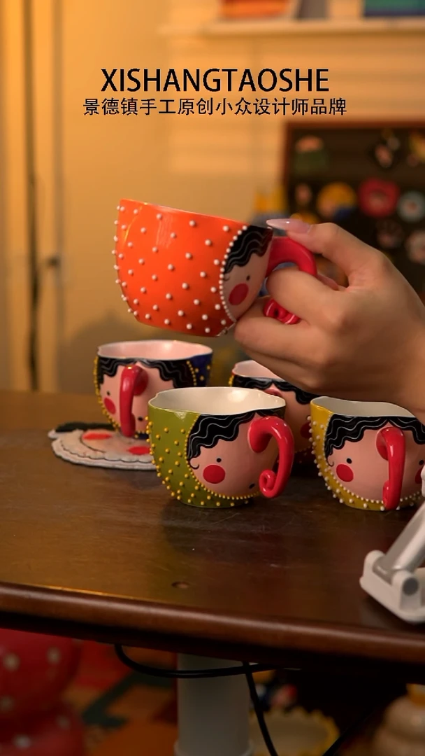 .喜上陶社花朵杯子橘色