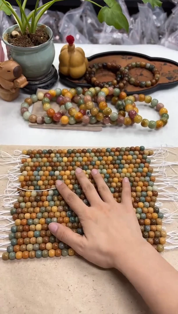 菩提根/象牙果手串1.0机抛奶豆子有麻子（926）