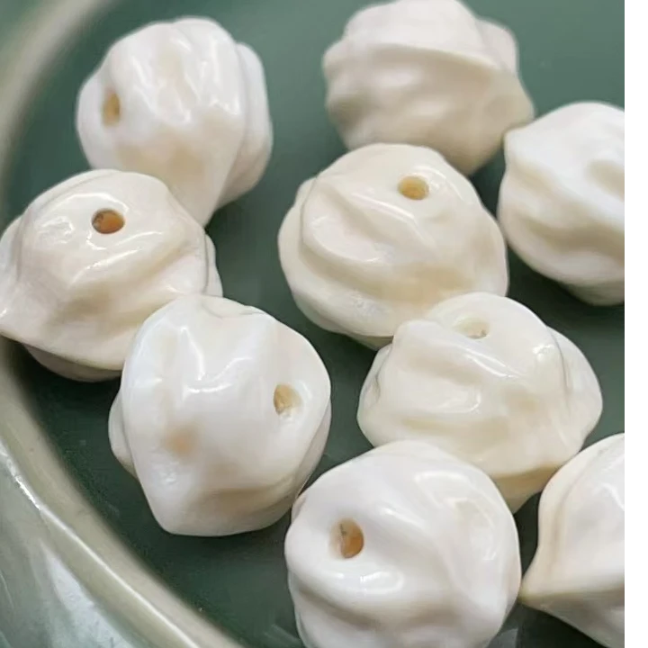 61523精品猛犸象牙11*10左右百香仔配珠配饰（发其一）