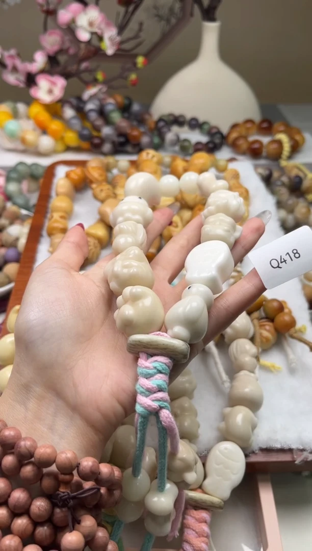 白玉菩提吊坠我****芦通货Q418牙果手持18-20mm一串