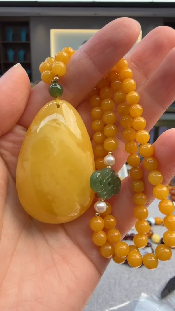 琥珀颈饰未镶嵌178秒拍号 假一罚三