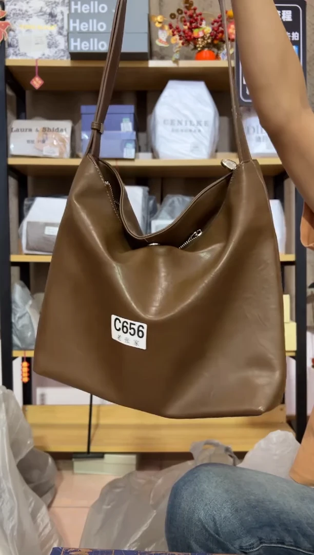小牛剖层皮革老张家女包656