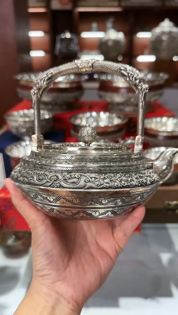 鑫***媒足银精工錾刻龙纹水波纹龙门提梁轮形烧水壶