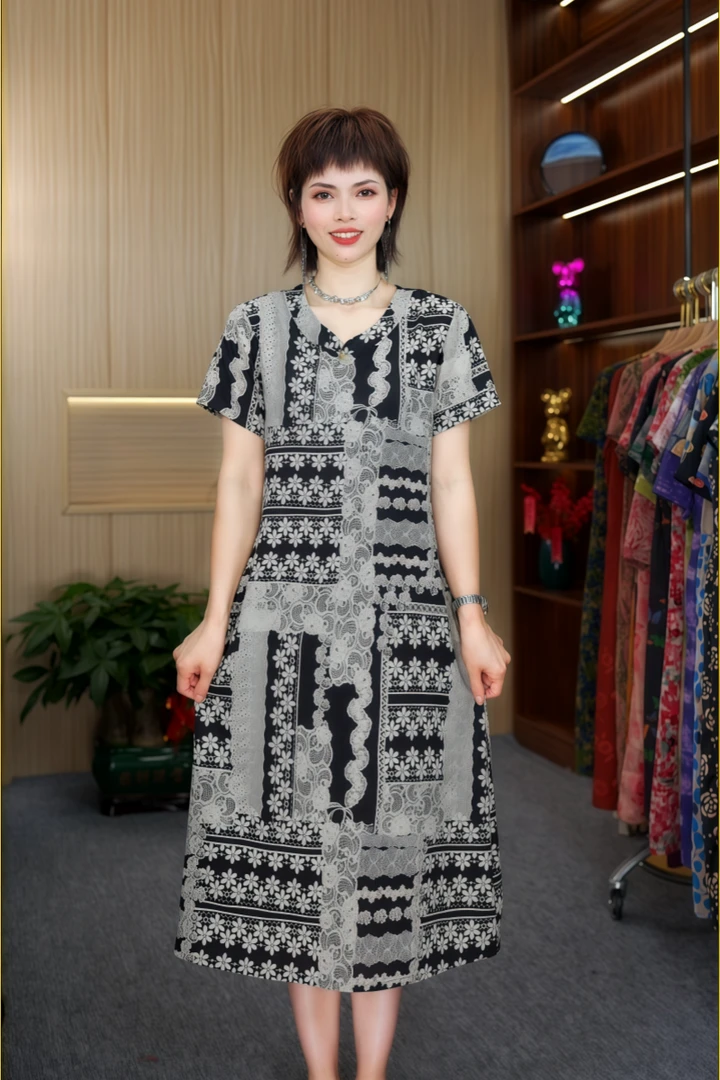 A-25307时尚宽松遮肉连衣裙V领黑白奇纹