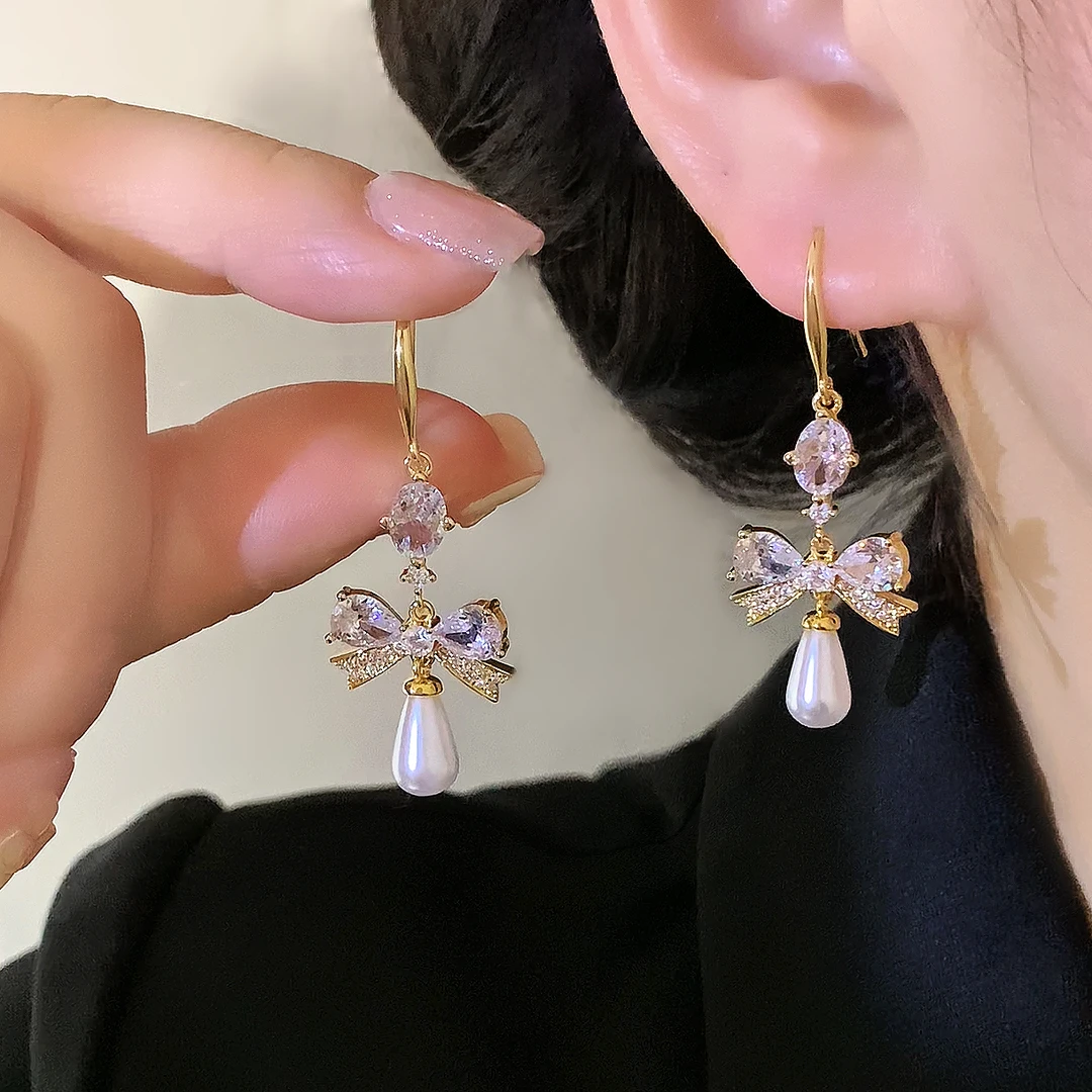 铜合金合成锆石耳饰 法式轻奢微镶锆石蝴蝶结白色珠珠耳环1289