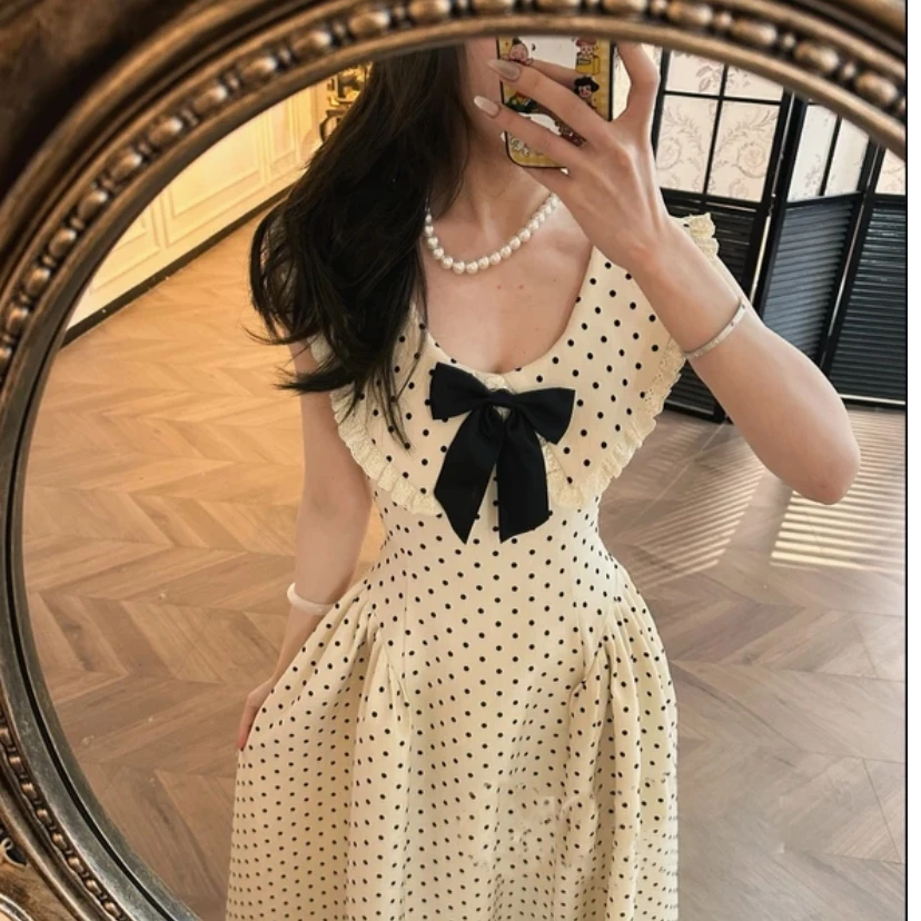 法式高级感波点蝴蝶结连衣裙女春夏季新款气质收腰捏褶绝美长裙子