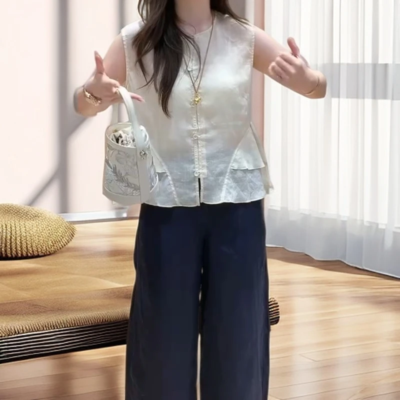 夏季圆领时尚气质单排扣荷叶边无袖小衫C5628