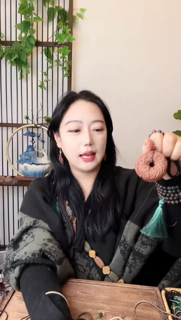 珠串息肌祥云扣